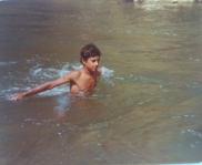 Ali swimming in the river