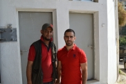 Ahmad's son with a volunteer from ACT for the Disappeared